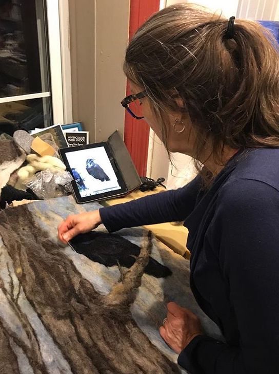 Pam working on raven Photo of Michelle Bruce